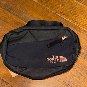 The North Face Black and Copper Belt Bag
